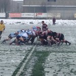 La mischia del Cernusco impegnata nella neve